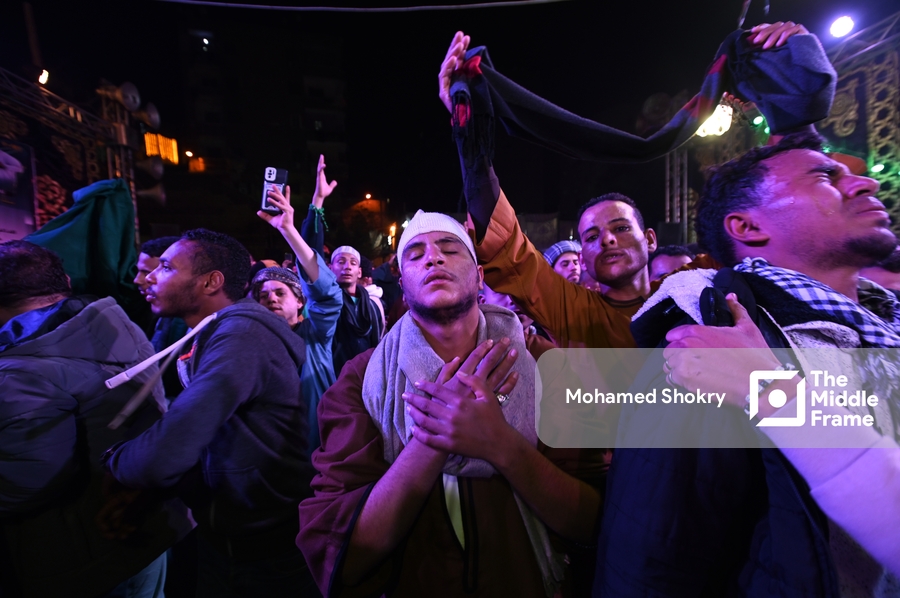 Man reacting to the beauty of Sufi songs in the birth of "Al-Sayyda Zeinab" Egypt.