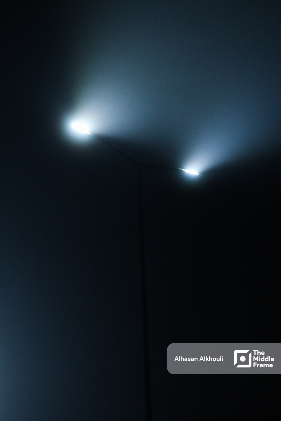 lamppost shining in the dark