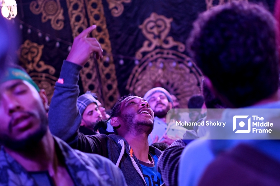 Man reacting to the beauty of Sufi songs in the birth of "Al-Sayyda Zeinab" Egypt.