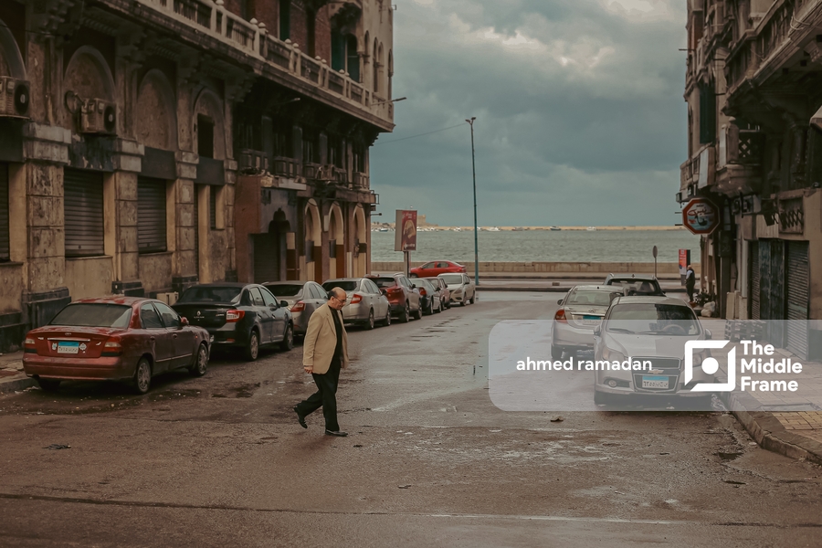 Old man crossing the street.