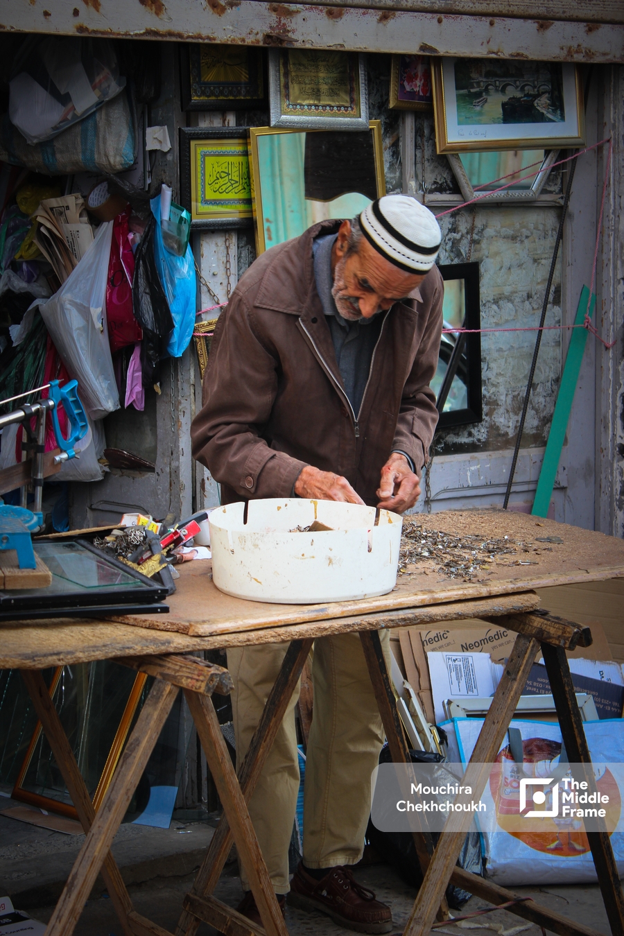 A portrait of an elderly Algerian man.