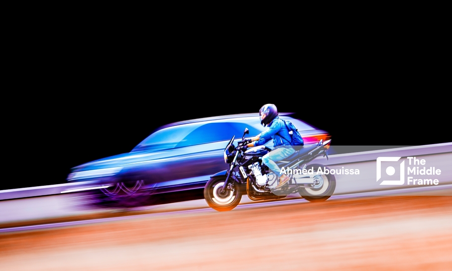 A person riding a motorcycle on a track
