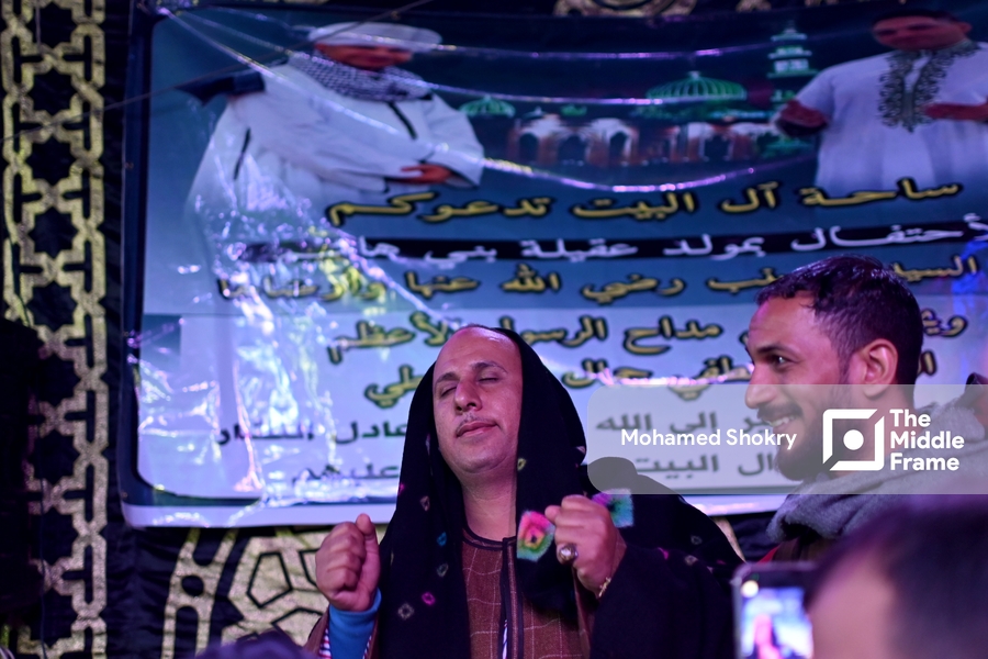 Man reacting to the beauty of Sufi songs in the birth of "Al-Sayyda Zeinab" Egypt.