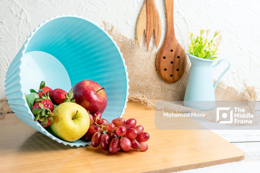 fruits falling out of bowl