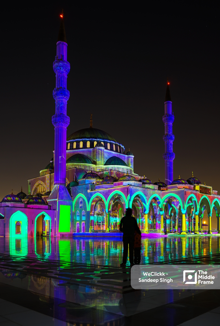 A night view of the Sharjah Grand Mosque.