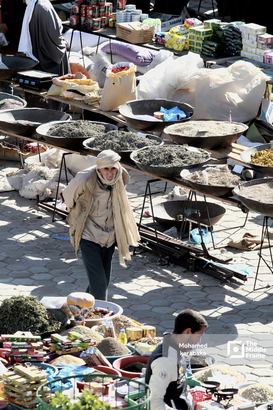 An Elder walking around the market