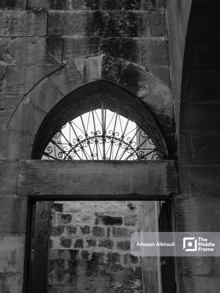 a window in the wall of an old building