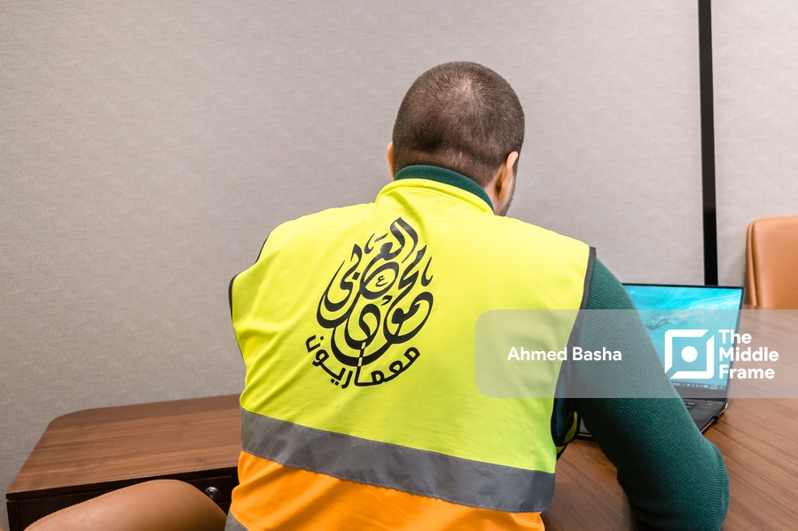 An Arab man in his office wearing the architects' uniform