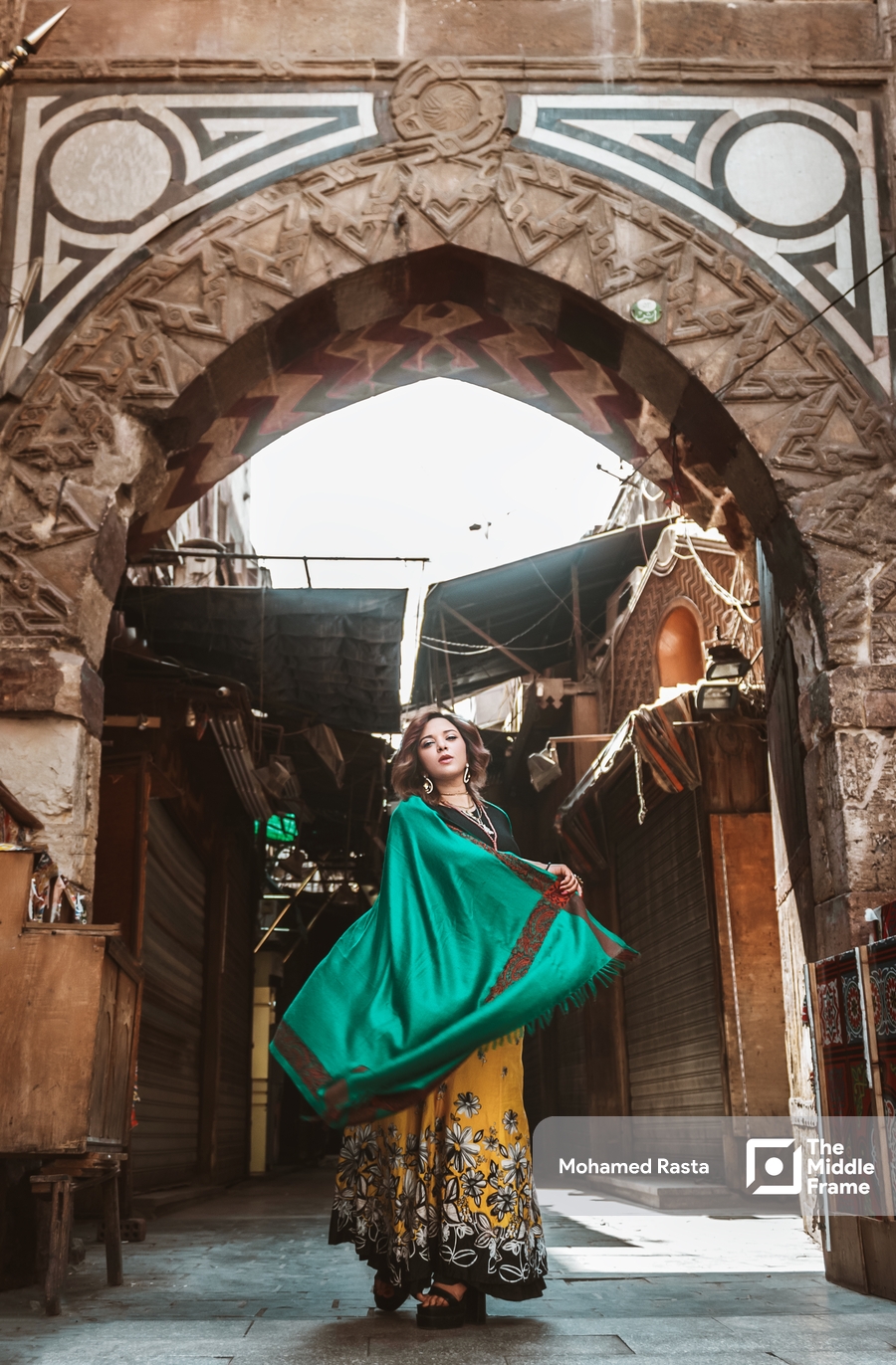 An Egyptian woman poses in the street