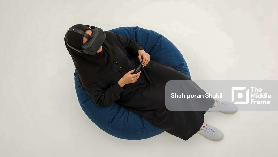 A woman sitting and playing video games remotely