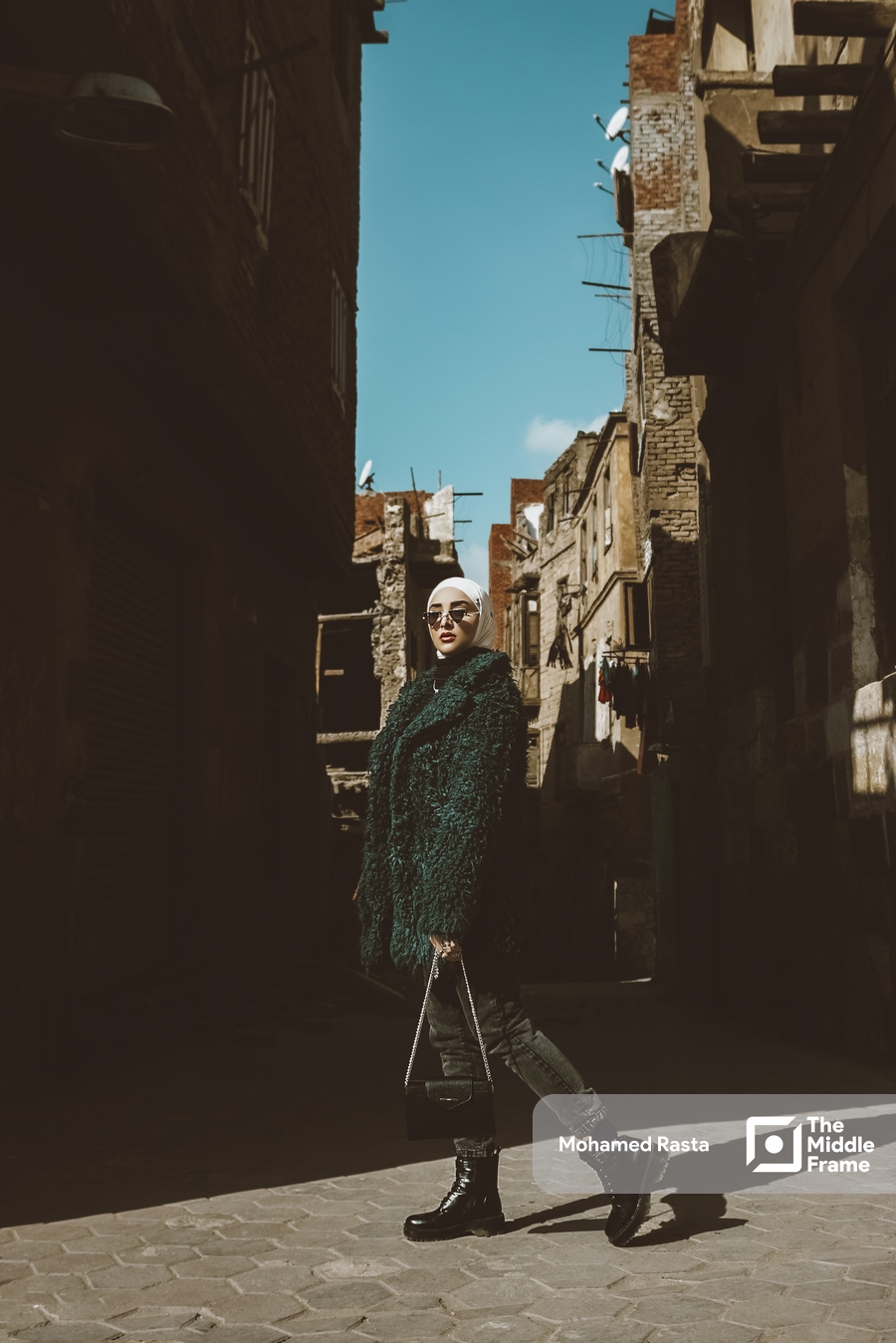 An Egyptian woman posing in the street