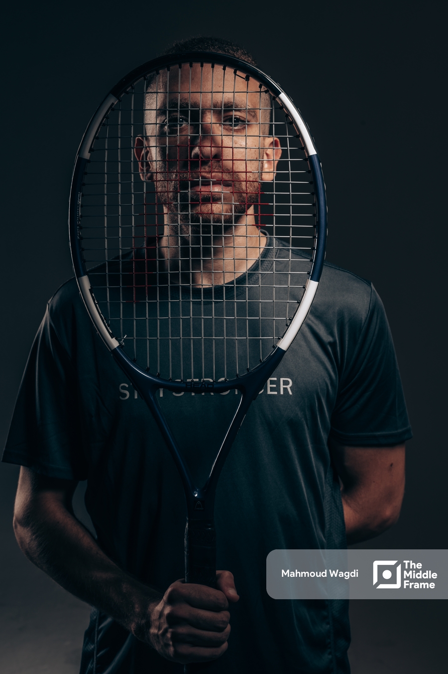 Man with tennis racket