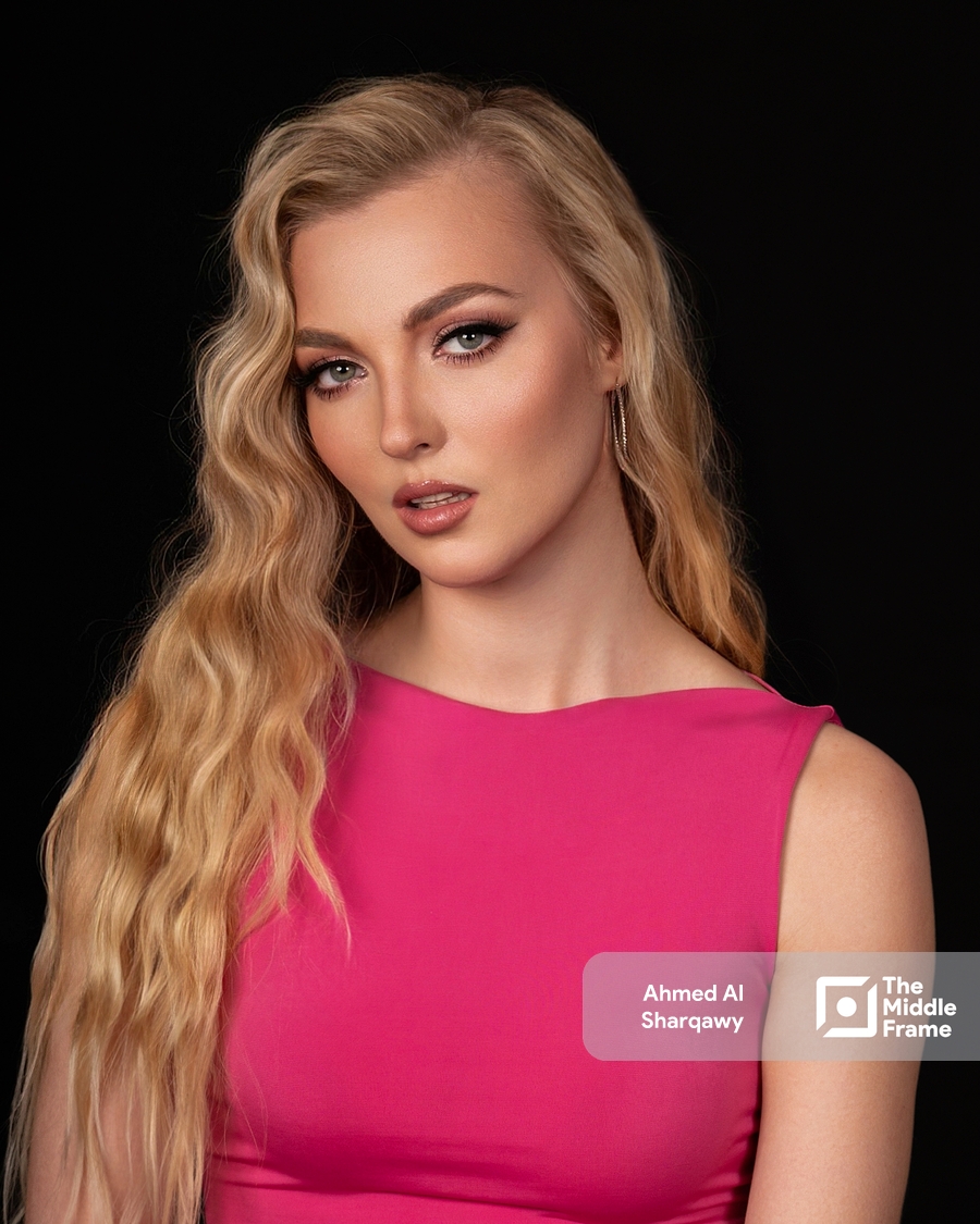 a woman in a pink dress