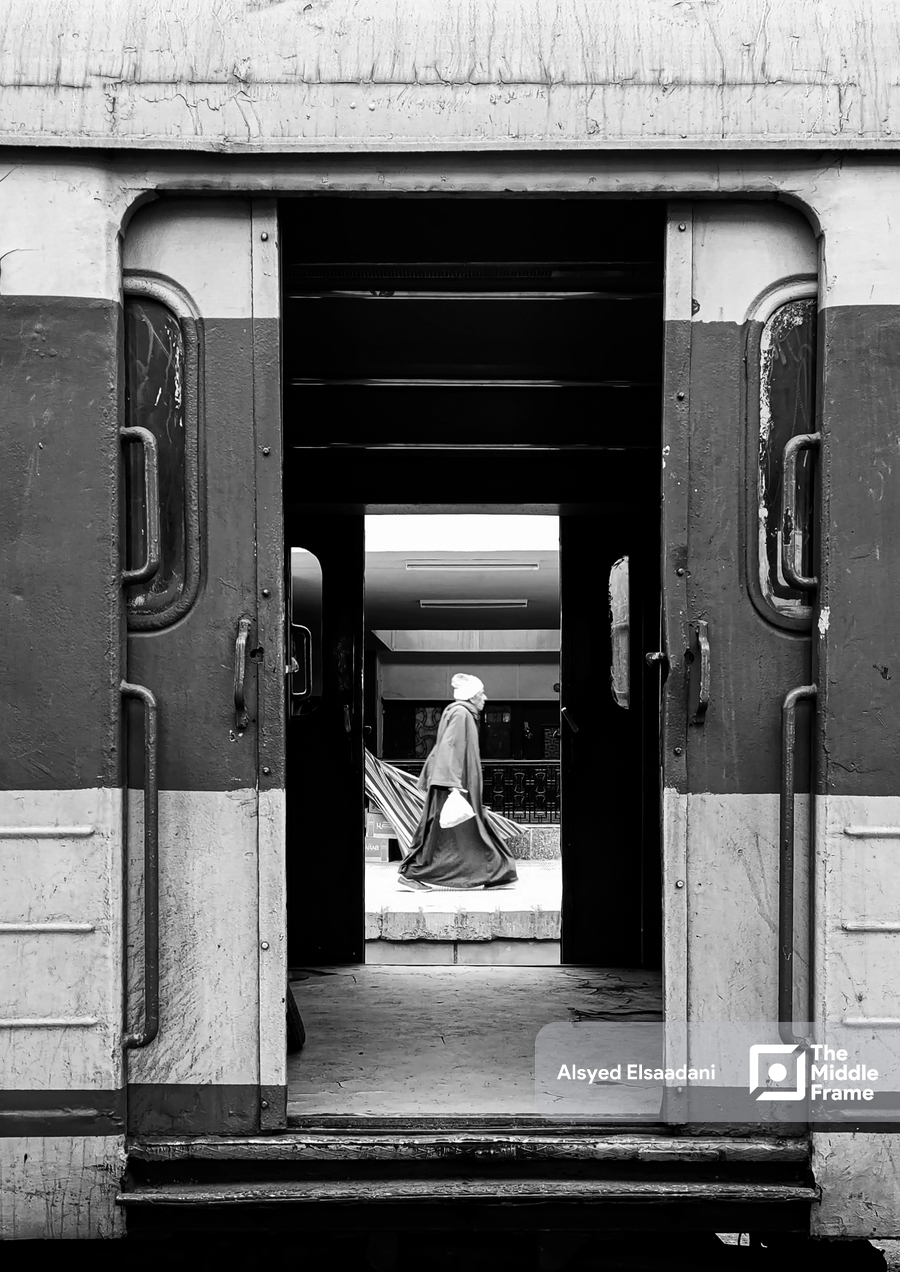 A black and white photo of a train