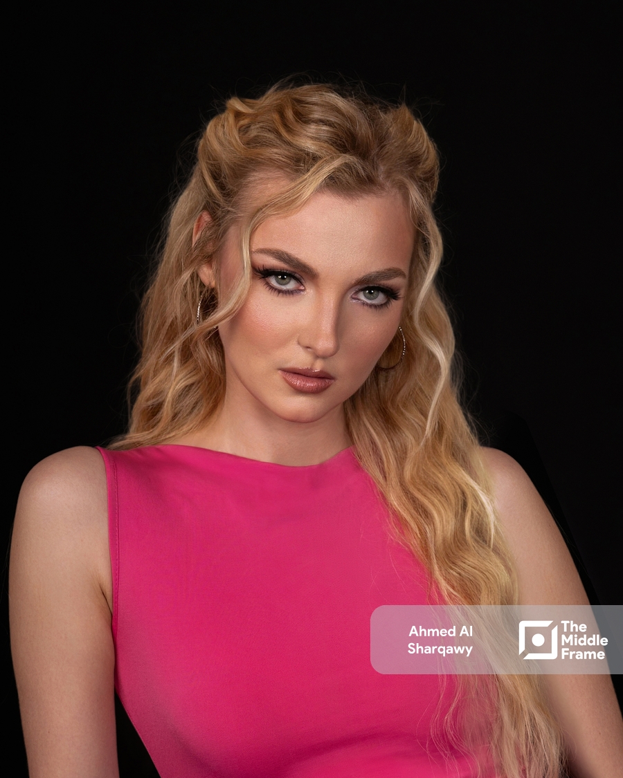 a woman in a pink dress