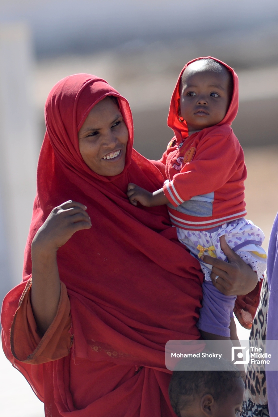 The mother's happiness with her son.