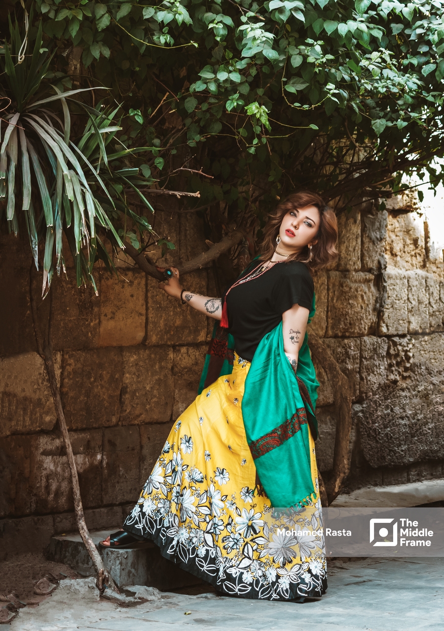 An Egyptian woman poses in the street