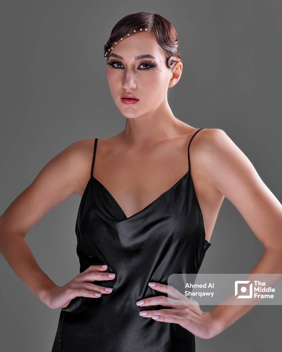 a woman in a black dress