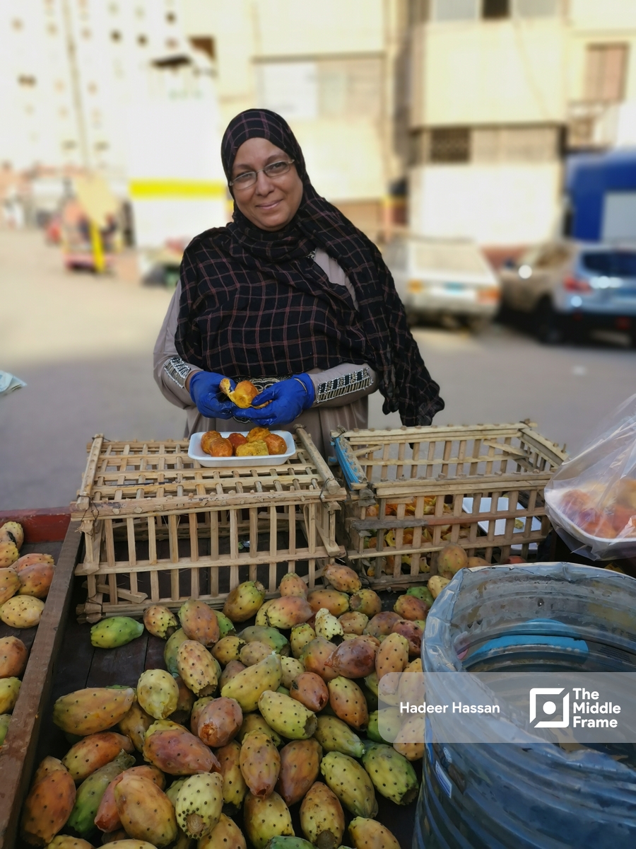 a woman selling prickly pears in Egypt