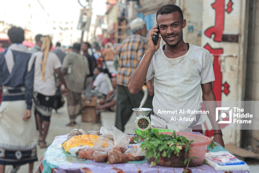 Portrait of a Yemeni chili vendor.