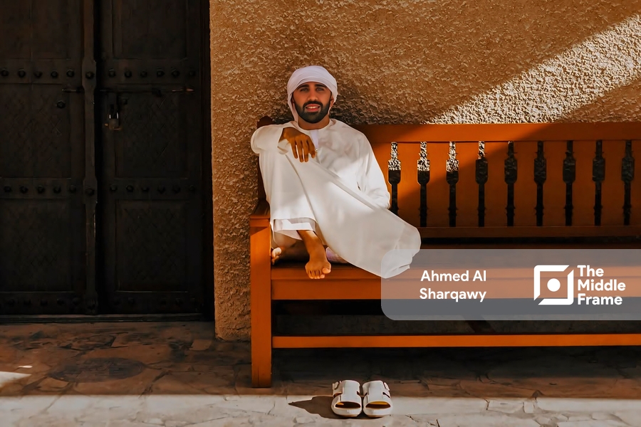 A Khaleeji man resting on a bench