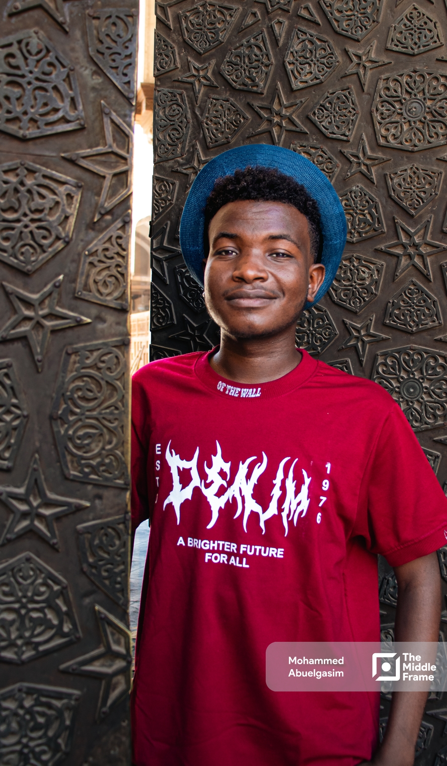 A portrait of a Sudanese young man.