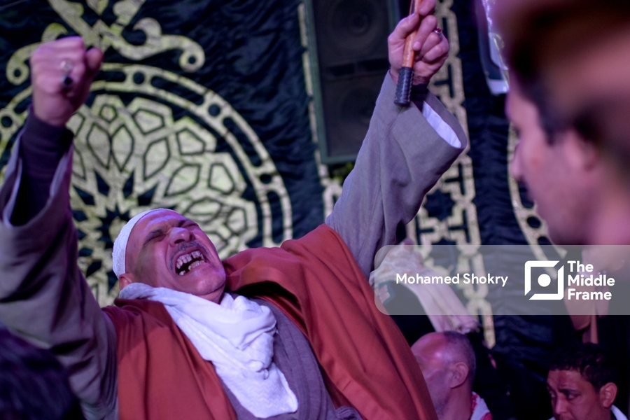 Man reacting to the beauty of Sufi songs in the birth of "Al-Sayyda Zeinab" Egypt.
