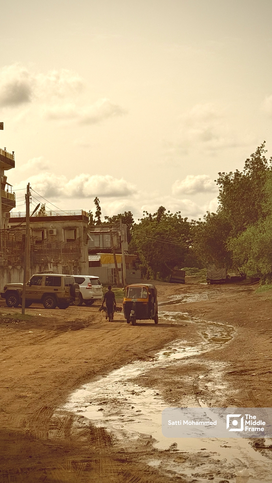 a building with a lot of dirt on the ground