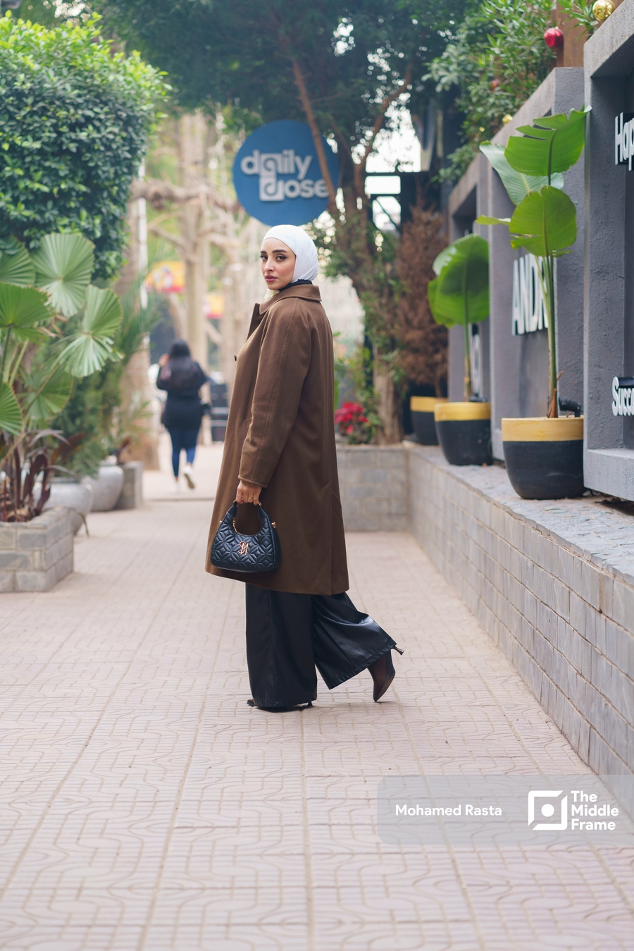 A hijabi Egyptian woman posing in the street