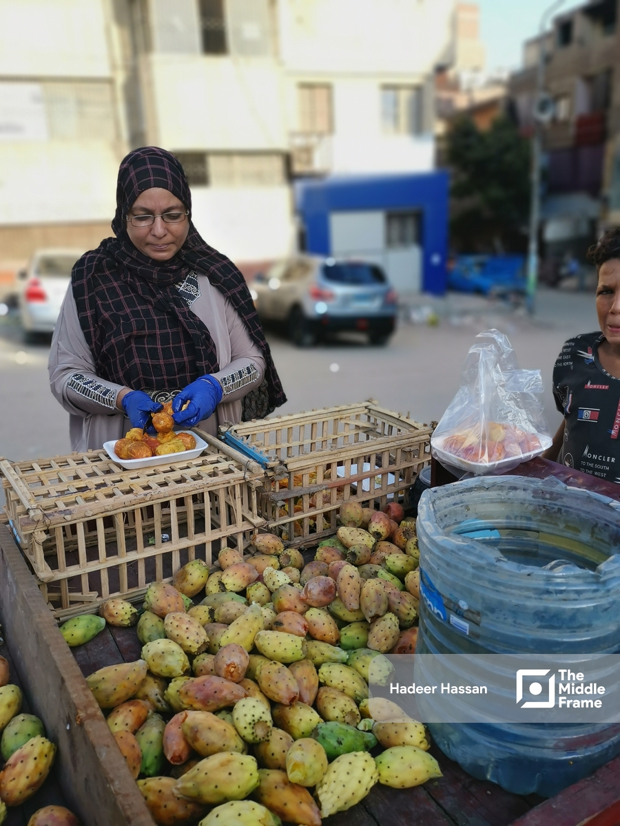 a woman selling prickly pears in Egypt