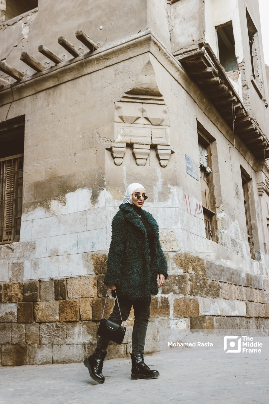 An Egyptian woman posing in the street