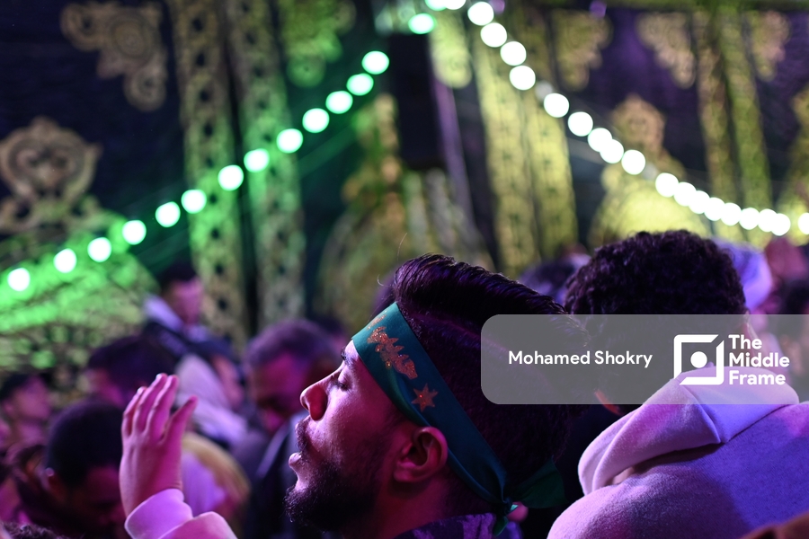 Man reacting to the beauty of Sufi songs in the birth of "Al-Sayyda Zeinab" Egypt.