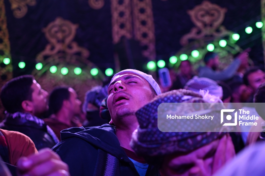 Man reacting to the beauty of Sufi songs in the birth of "Al-Sayyda Zeinab" Egypt.