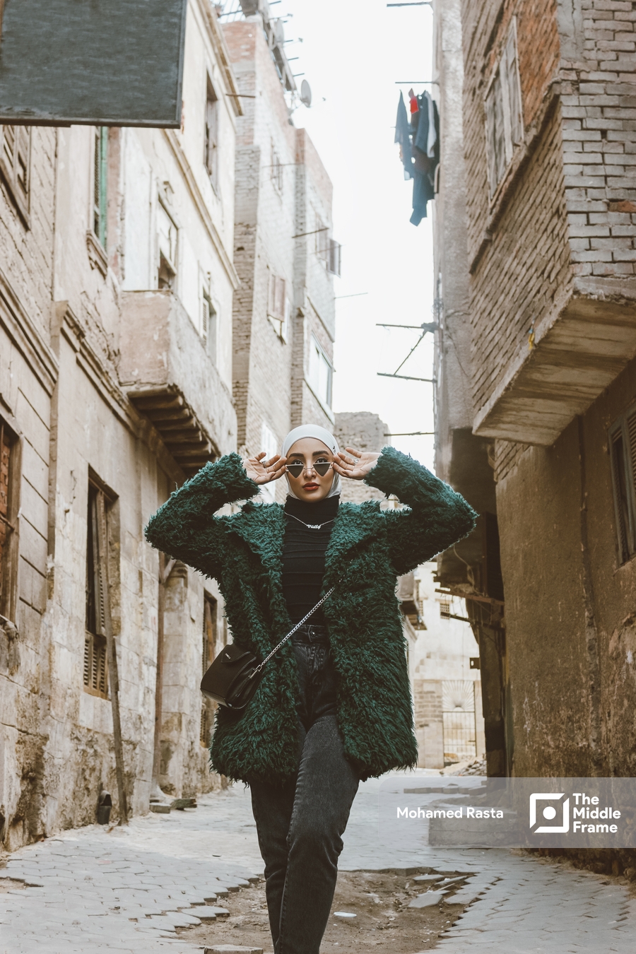 An Egyptian woman posing in the street