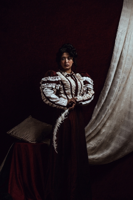 A woman posing for the camera.