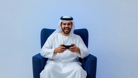 A man sitting on a blue chair