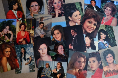 A bunch of scattered photos of an old egyptian actress