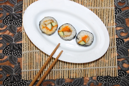 A serving of sushi rolls