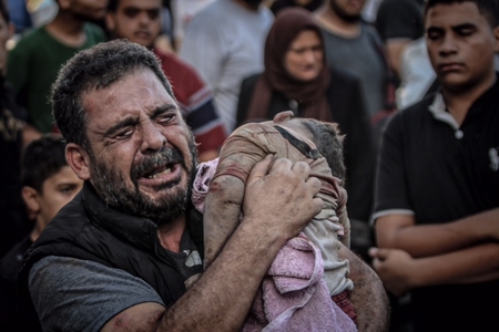 Palestinian father cries and bids farewell to his martyred child Gaza ...