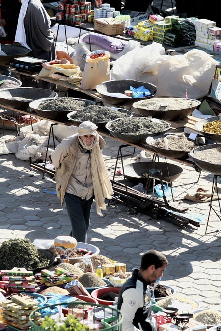 An Elder walking around the market