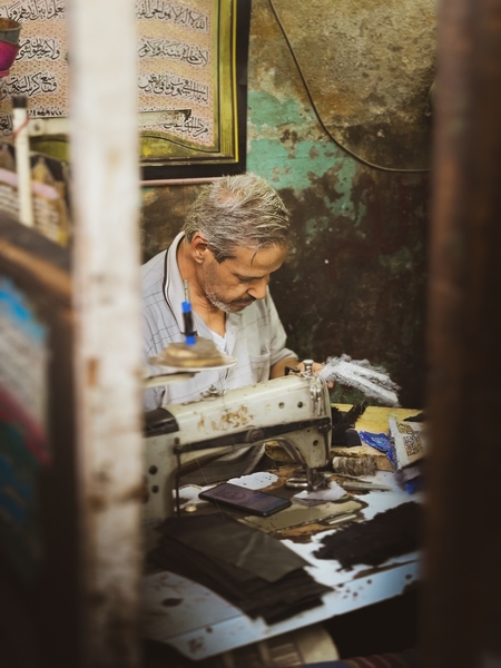 A moment from the life of Al-Muizz Street, Cairo, Egypt
