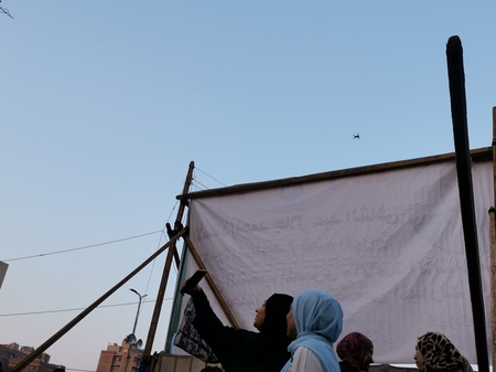 Two hijabi Egyptian women taking a selfie
