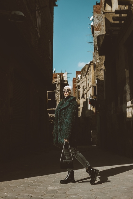 An Egyptian woman posing in the street