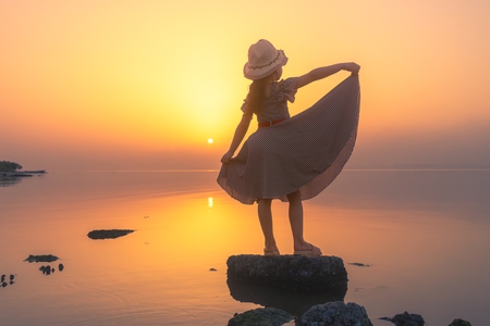 A little girl on the beach.