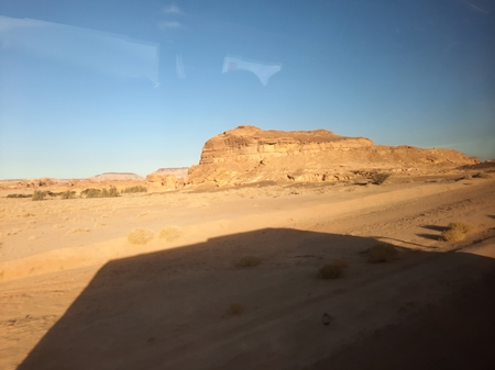 The shadow of a person in the desert