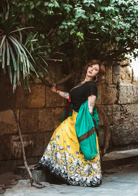 An Egyptian woman poses in the street