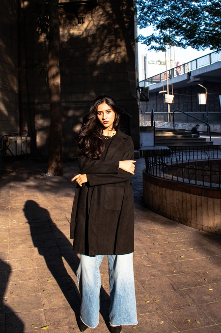 An Egyptian woman poses in sunlight