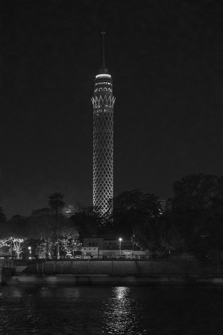Cairo Tower and the Nile at night.