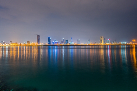 the skyline of Manama  at night